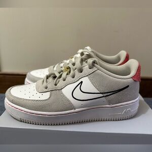 Nike Air Force 1s. Kids size 6Y, equivalent to a women’s size 7.5.